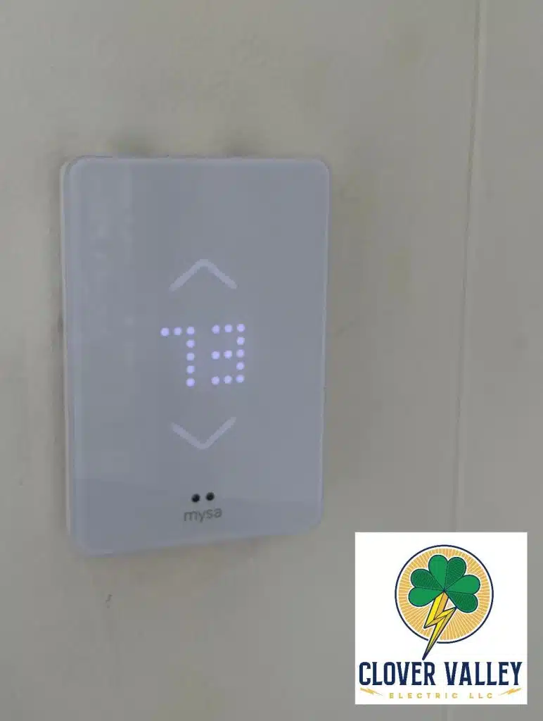 A Mysa Wi-fi Thermostat controlling some new electric baseboard heaters.